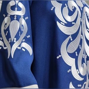 Flawlessly Flared - Intricately Embroidered Maxi Dress with Long Sleeves.